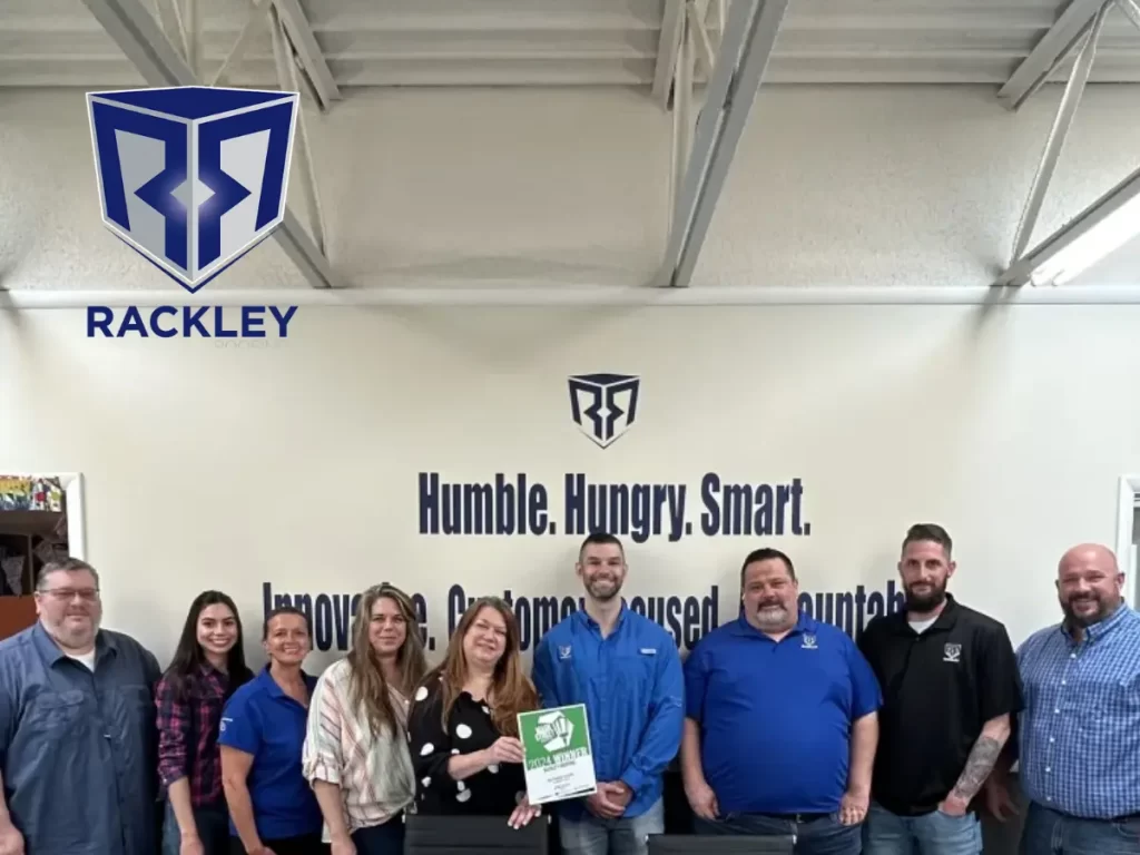 Rackley Roofing Team Photo holding 2024 Main Street Best Roofing Company Award