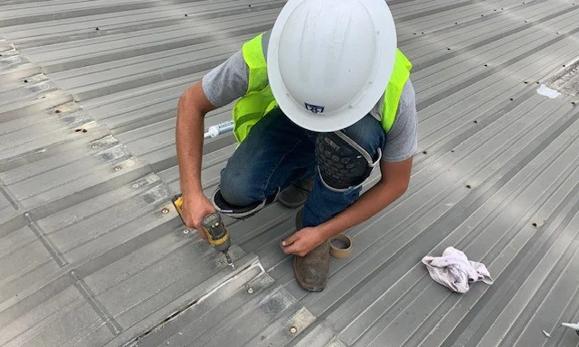 Working on a metal roof